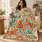 Flores que abrazan blanket, wrapped around a reader