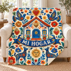 Milagros del hogar blanket, on a sofa