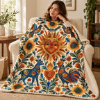 Sol del corazon blanket, wrapped around a reader
