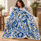 Azul de Puebla blanket, wrapped around a reader
