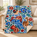 Granadas y flores blanket, on a sofa