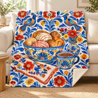Mesa de la abuela blanket, on a sofa