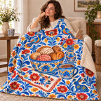 Mesa de la abuela blanket, wrapped around a reader