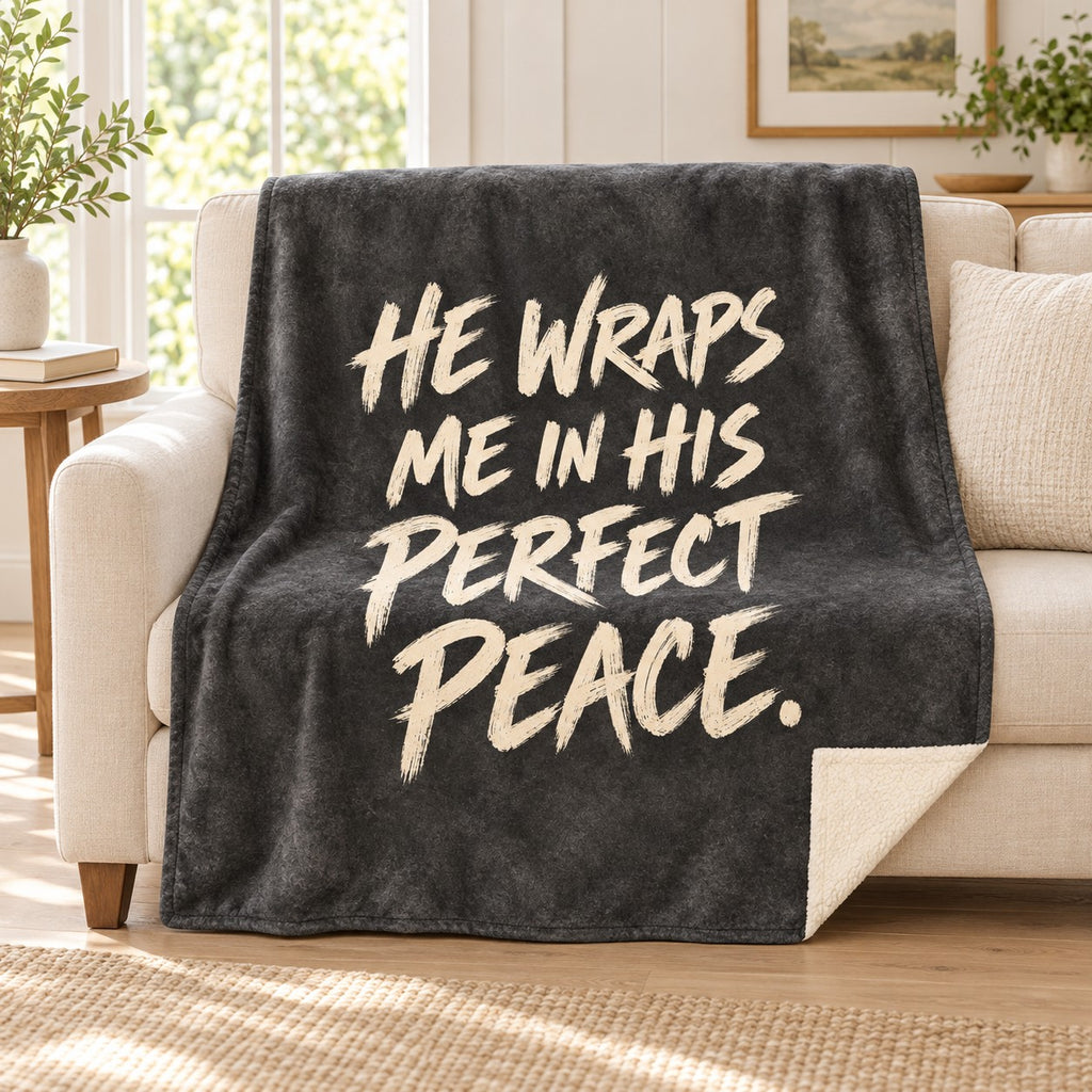 Charcoal Stillness blanket, on a sofa