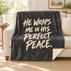 Charcoal Stillness blanket, on a sofa