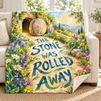 The Stone Was Rolled Away blanket, on a sofa