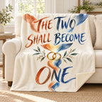 The Two Shall Become One blanket, on a sofa