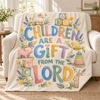 Children Are a Gift from the Lord blanket, on a sofa
