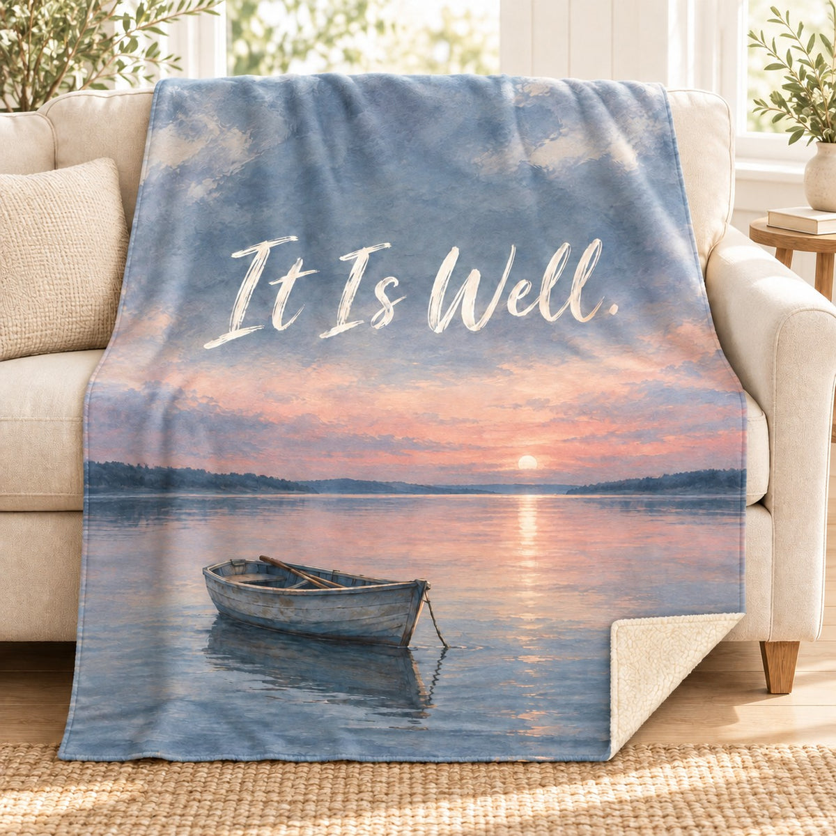 It Is Well blanket, on a sofa