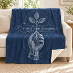 Created with Intention blanket, on a sofa