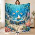 Ocean of Stories blanket, held open