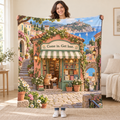The Cat's Bookshop blanket, held open