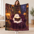 The Little Ghost Reader blanket, held open