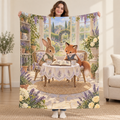 The Bookish Tea Party blanket, held open