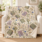 Wildflower Paperbacks blanket, on a sofa