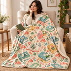 Little Blooming Books blanket, wrapped around a reader
