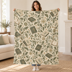 Sage Endpapers blanket, held open
