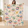 Tiny Rainbow Spines blanket, held open