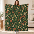 Woodland ABC blanket, held open