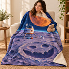 The Pumpkin Moon Landing blanket, wrapped around a reader