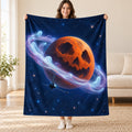 The Ringed Halloween Planet blanket, held open