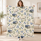 Blue Ink Alphabet blanket, held open
