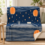 The Lantern Rain blanket, on a sofa