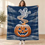The Frosted Jack O Lantern blanket, held open