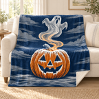 The Frosted Jack O Lantern blanket, on a sofa