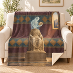 The Unfinished Statue blanket, on a sofa