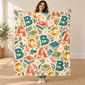 Little Letter Garden blanket, held open