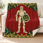 The Pumpkin Shield Bearer blanket, on a sofa