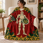 The Pumpkin Shield Bearer blanket, wrapped around a reader