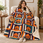 Pumpkin Log Cabin blanket, wrapped around a reader