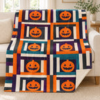 Pumpkin Log Cabin blanket, on a sofa