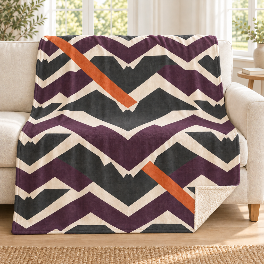 Bat Flight Chevrons blanket, on a sofa