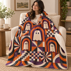 Ghost Cathedral Windows blanket, wrapped around a reader