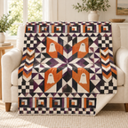 October Starburst blanket, on a sofa