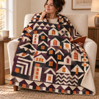 Haunted House Tessellation blanket, wrapped around a reader