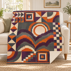 Midnight Bargello blanket, on a sofa