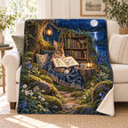 Moonbeam Bedtime blanket, on a sofa