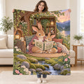 Mother Rabbit Reads blanket, held open