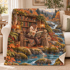 Autumn River Journal blanket, on a sofa