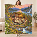 Otter Family Tales blanket, held open