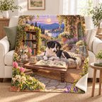 The Garden Library blanket, on a sofa