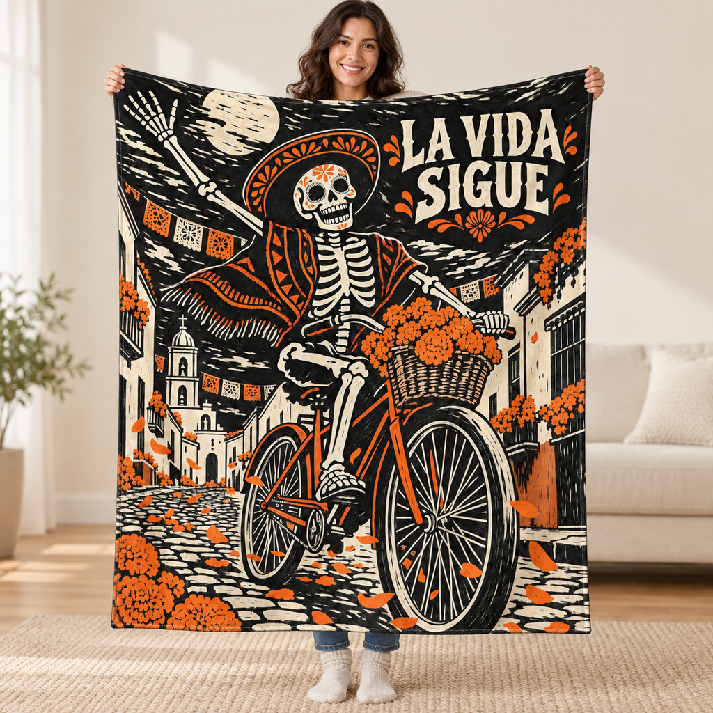La Vida Sigue blanket, held open