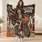 La Vida Sigue blanket, held open