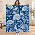 Blue Birds and Marigolds blanket, held open