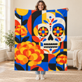 Bauhaus Calavera blanket, held open
