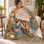 The Blue Castle blanket, wrapped around a reader